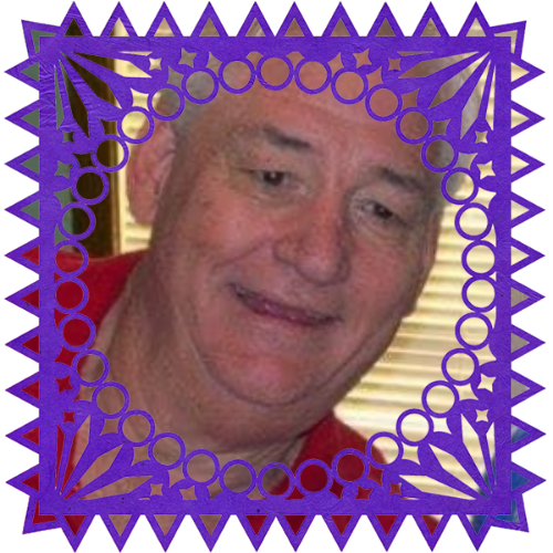 Photo of John Jameson in a frame with papel picado.