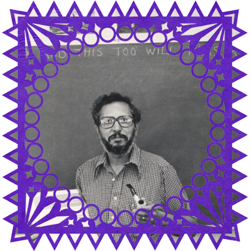 Photo of John R. Shiban in a frame with papel picado.