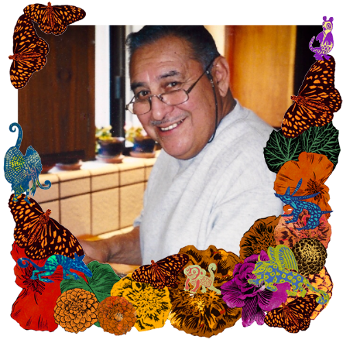 Photo of Joseph Torres Sr. in a frame with marigolds, flowers, alebrijes and monarch butterflies.