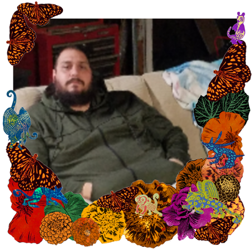 Photo of Kris Gallaga in a frame with marigolds, flowers, alebrijes and monarch butterflies.