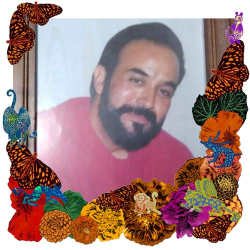 Photo of Lonnie Abeyta in a frame with marigolds, flowers, alebrijes and monarch butterflies.