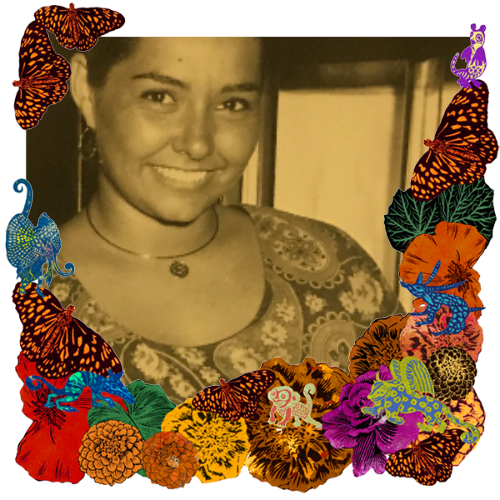 Photo of Madeline in a frame with marigolds, flowers, alebrijes and monarch butterflies.