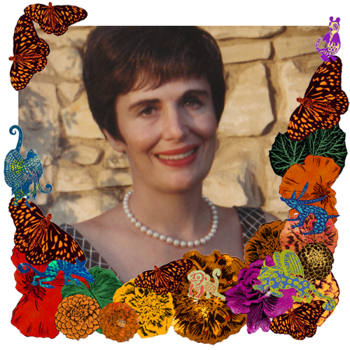 Photo of Mamacita in a frame with marigolds, flowers, alebrijes and monarch butterflies.