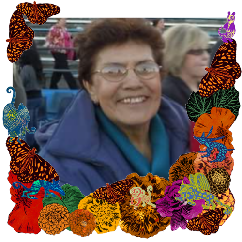 Photo of Margarita Mendoza in a frame with marigolds, flowers, alebrijes and monarch butterflies.