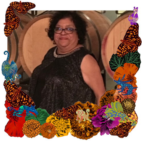 Photo of Maria Alice Morales in a frame with marigolds, flowers, alebrijes and monarch butterflies.