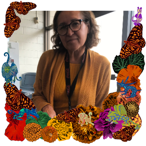 Photo of Maria Garcia in a frame with marigolds, flowers, alebrijes and monarch butterflies.