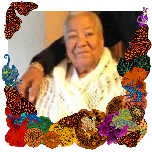 Photo of Maria Rodriguez in a frame with marigolds, flowers, alebrijes and monarch butterflies.