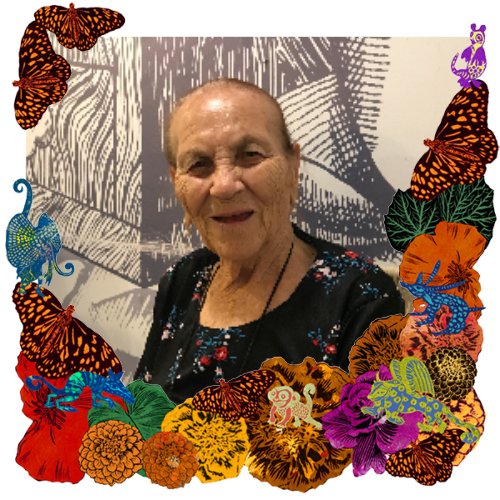 Photo of María de Jesús Anaya López in a frame with marigolds, flowers, alebrijes and monarch butterflies.