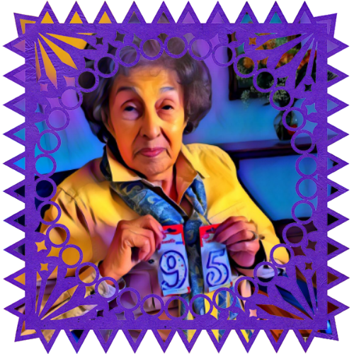 Photo of Mary Martinez in a frame with papel picado.