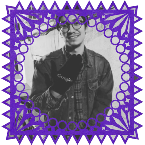 Photo of Maury in a frame with papel picado.