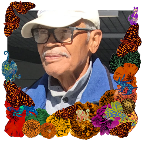 Photo of Meu amado pai in a frame with papel picado.