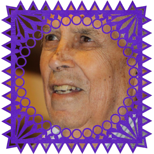 Photo of Mi Papi in a frame with papel picado.