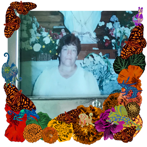 Photo of Mi abuelita Lulú in a frame with marigolds, flowers, alebrijes and monarch butterflies.
