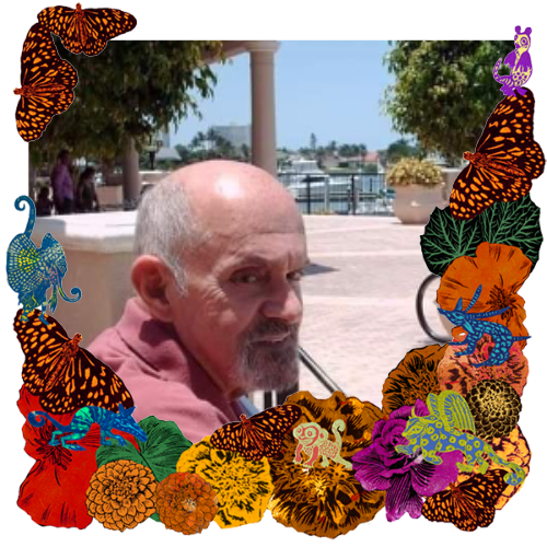 Photo of Michael Joseph Peter Abatemarco in a frame with marigolds, flowers, alebrijes and monarch butterflies.
