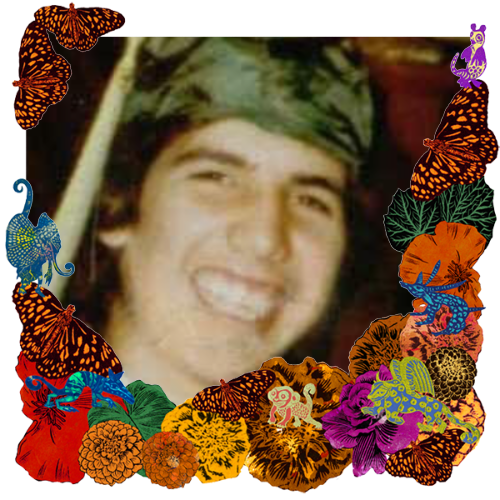 Photo of Michael in a frame with marigolds, flowers, alebrijes and monarch butterflies.