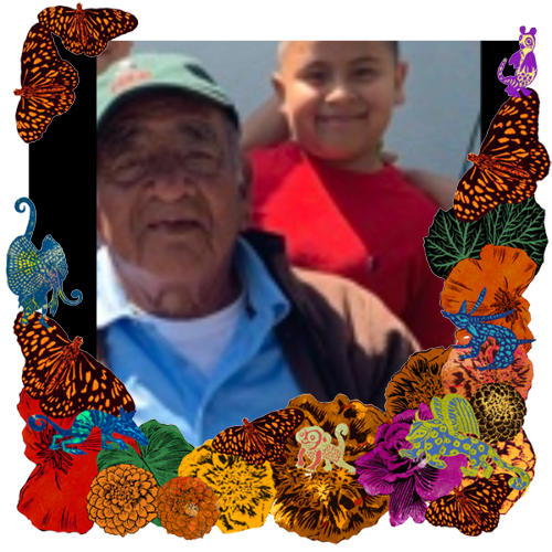 Photo of Mi papá y sobrino in a frame with marigolds, flowers, alebrijes and monarch butterflies.