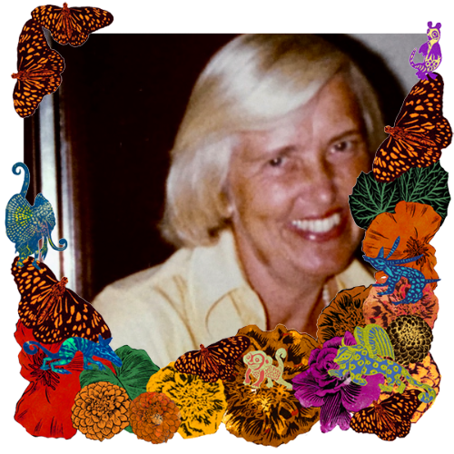 Photo of Mitzi Currie in a frame with marigolds, flowers, alebrijes and monarch butterflies.