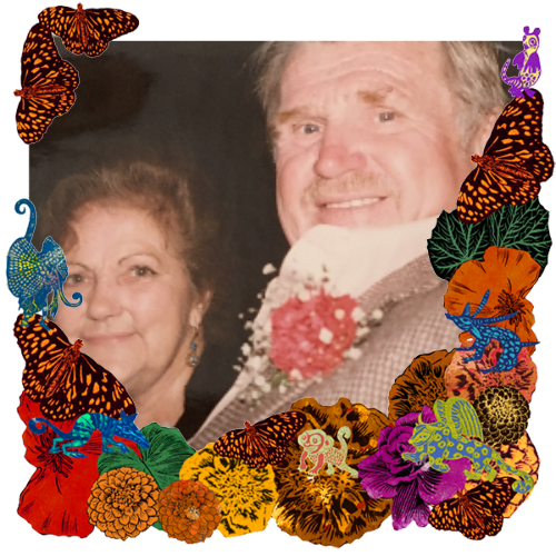 Photo of Mom & Dad Swenson in a frame with marigolds, flowers, alebrijes and monarch butterflies.