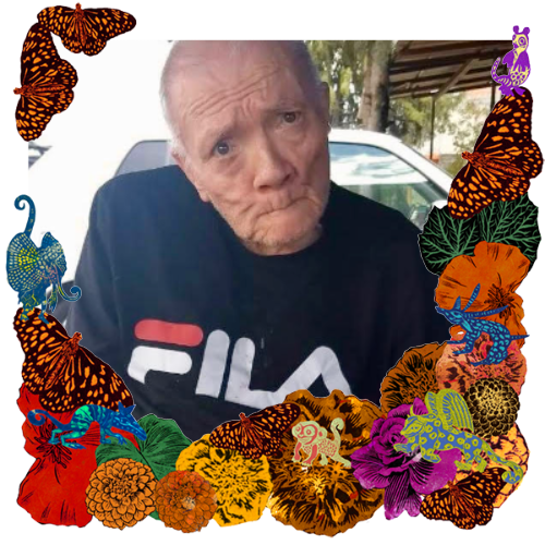Photo of My Father in a frame with marigolds, flowers, alebrijes and monarch butterflies.