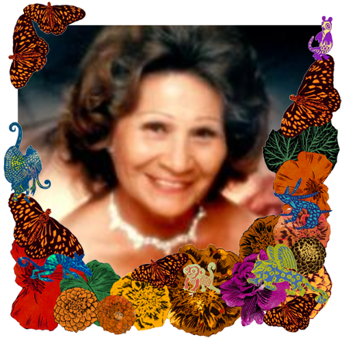 Photo of My mom in a frame with marigolds, flowers, alebrijes and monarch butterflies.