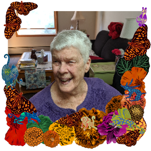 Photo of My mom in a frame with marigolds, flowers, alebrijes and monarch butterflies.