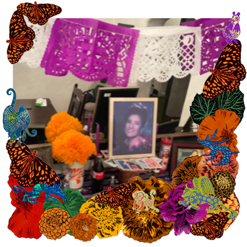 Photo of My mom in a frame with marigolds, flowers, alebrijes and monarch butterflies.