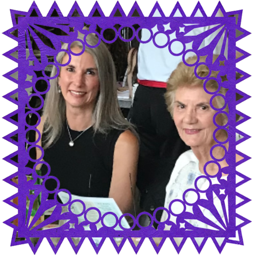 Photo of My Mom in a frame with papel picado.