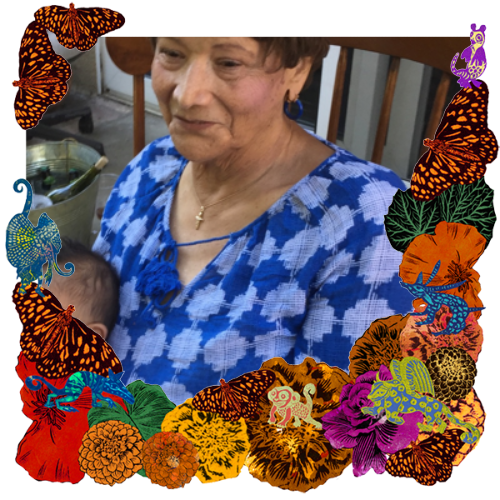 Photo of My mother in a frame with marigolds, flowers, alebrijes and monarch butterflies.