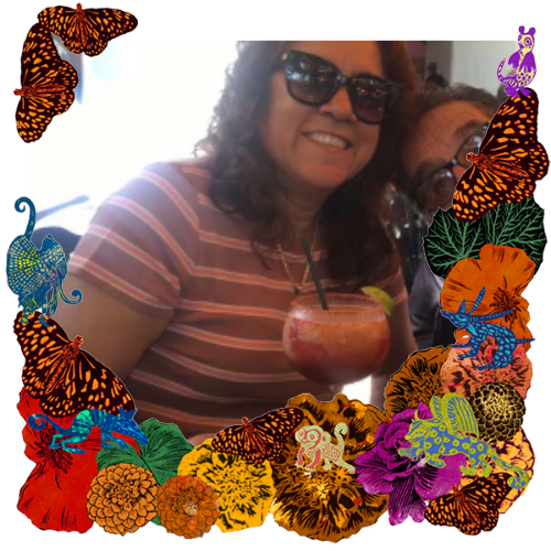 Photo of My mother in a frame with papel picado.