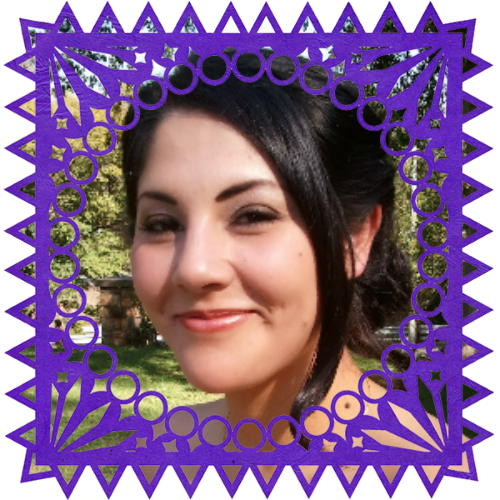 Photo of Nancy Arias in a frame with papel picado.