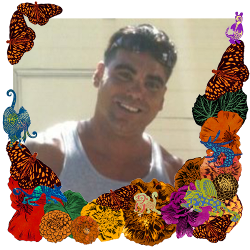 Photo of Nerry Borque in a frame with papel picado.