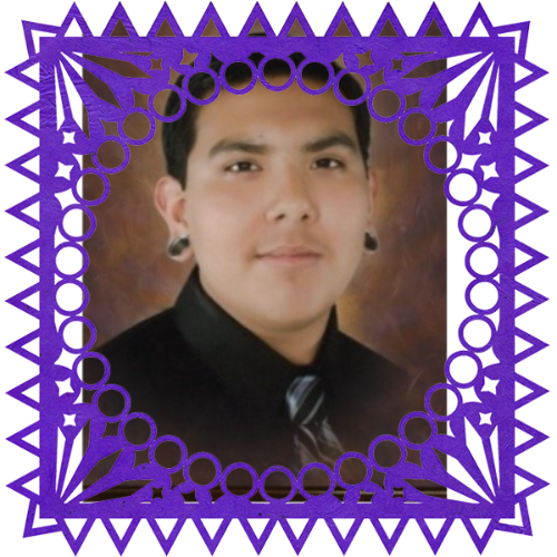 Photo of Our friend Martin in a frame with papel picado.