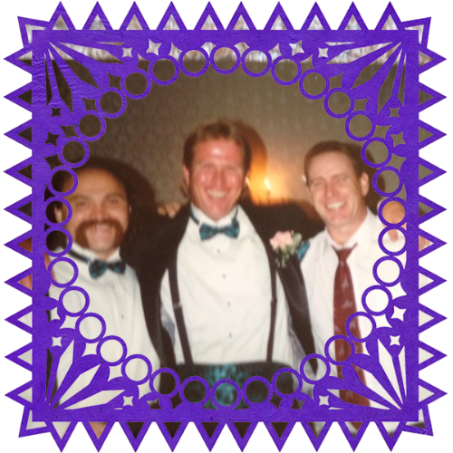 Photo of Patrick Devlin in a frame with papel picado.