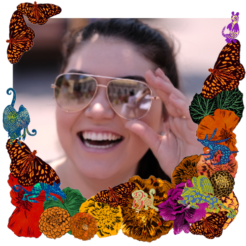 Photo of Paulina Verbera in a frame with marigolds, flowers, alebrijes and monarch butterflies.