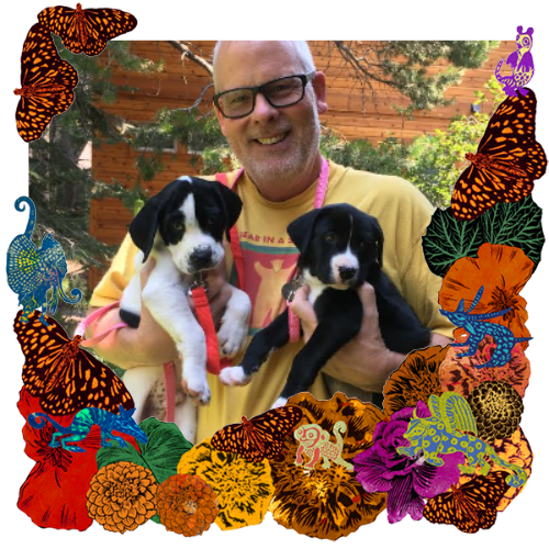 Photo of Peter Jackson in a frame with marigolds, flowers, alebrijes and monarch butterflies.