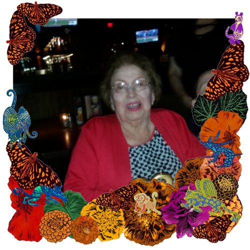 Photo of Ramona Anzures in a frame with marigolds, flowers, alebrijes and monarch butterflies.