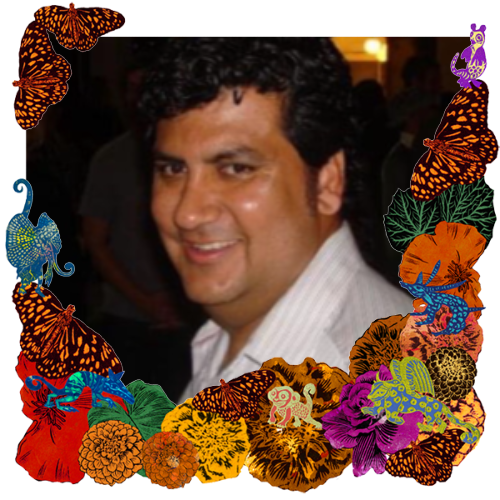 Photo of Randy Guzman in a frame with marigolds, flowers, alebrijes and monarch butterflies.