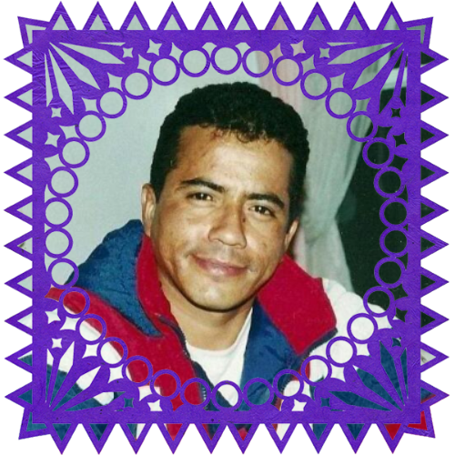 Photo of Raul "Chino" Piceno in a frame with papel picado.
