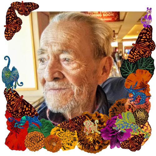 Photo of Roberto Gonzalez in a frame with marigolds, flowers, alebrijes and monarch butterflies.
