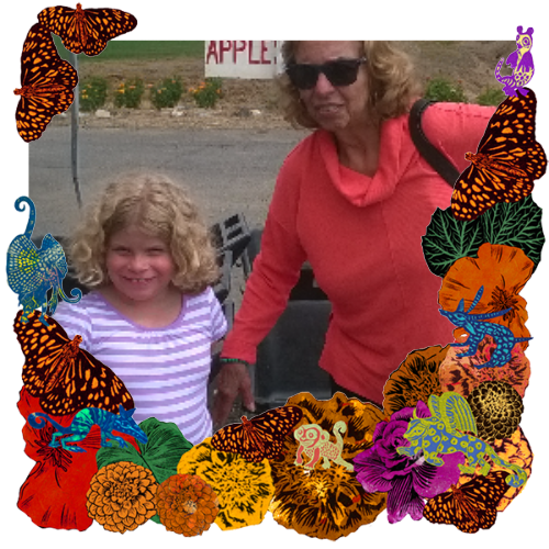 Photo of Ruby Solorzano in a frame with marigolds, flowers, alebrijes and monarch butterflies.