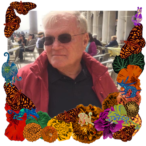 Photo of Steve Burrell in a frame with marigolds, flowers, alebrijes and monarch butterflies.