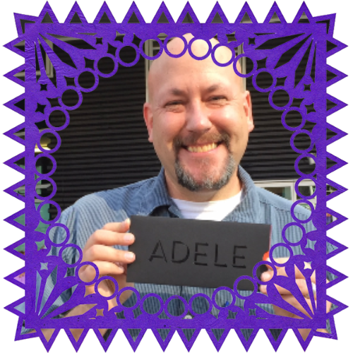 Photo of Steve Linkchorst in a frame with papel picado.
