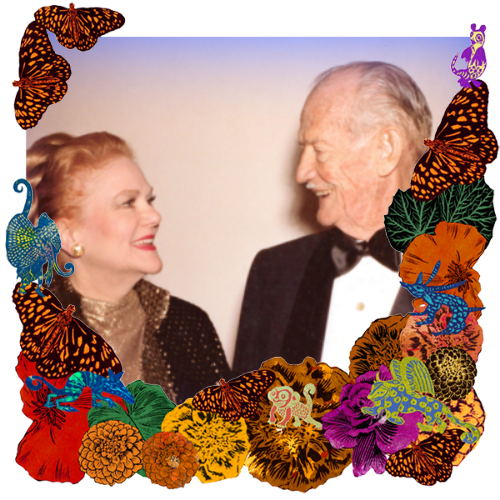 Photo of Thomas Jefferson Andre 2nd & Elois Jenssen Andre in a frame with marigolds, flowers, alebrijes and monarch butterflies.