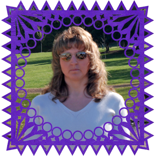 Photo of Teresa Wegner in a frame with papel picado.