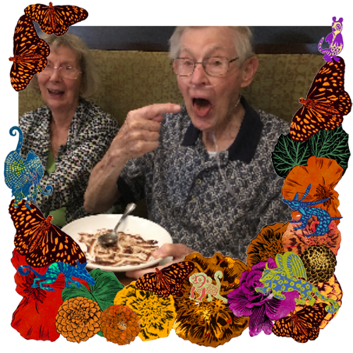 Photo of Thomas Ewart in a frame with marigolds, flowers, alebrijes and monarch butterflies.
