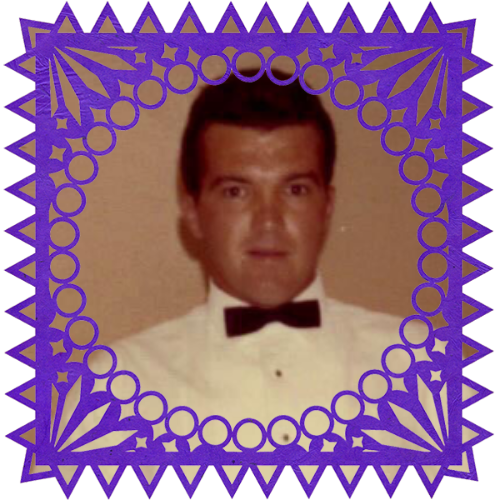 Photo of Tom Roney in a frame with papel picado.