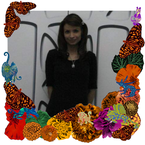 Photo of Vanessa Rosalia Marquez in a frame with marigolds, flowers, alebrijes and monarch butterflies.