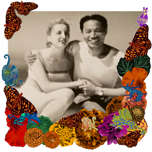 Photo of Mis Padres in a frame with marigolds, flowers, alebrijes and monarch butterflies.