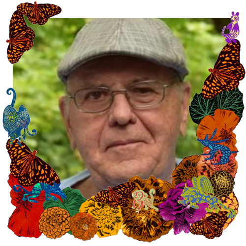 Photo of Dad in a frame with marigolds, flowers, alebrijes and monarch butterflies.