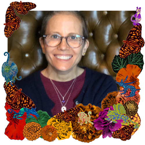 Photo of Annie in a frame with marigolds, flowers, alebrijes and monarch butterflies.